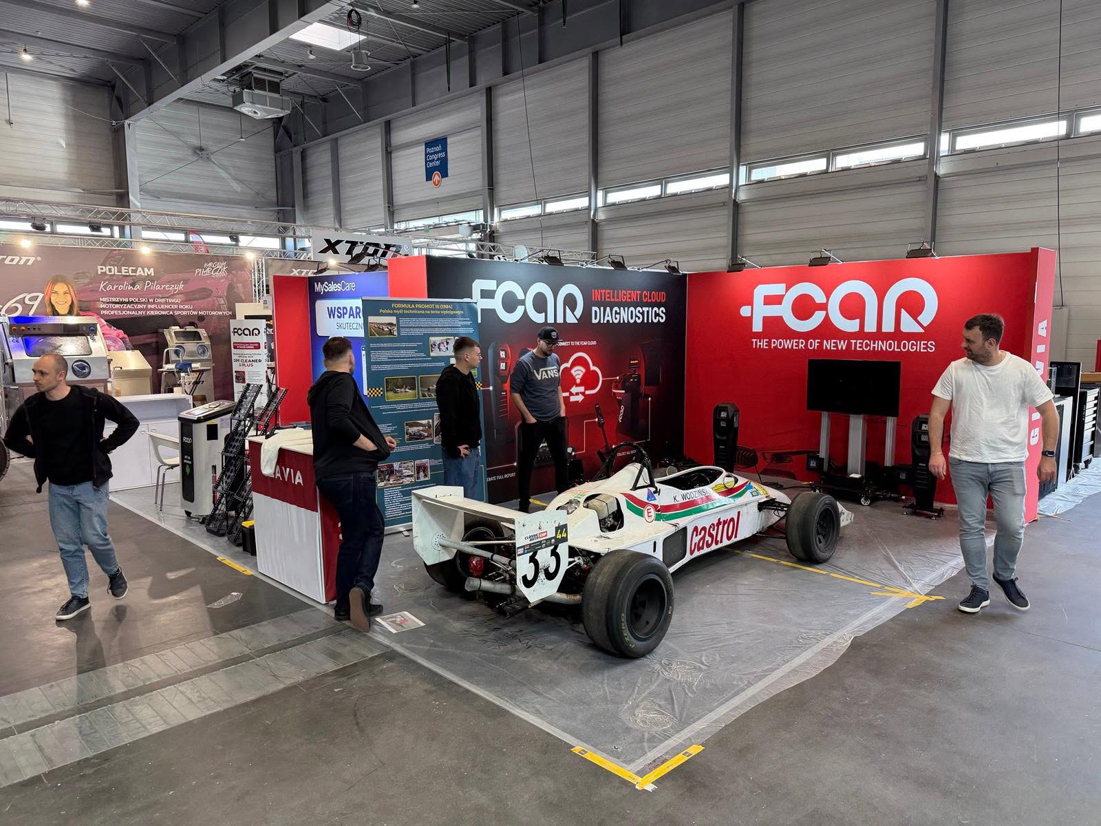 FCAR trade show stand with visitors